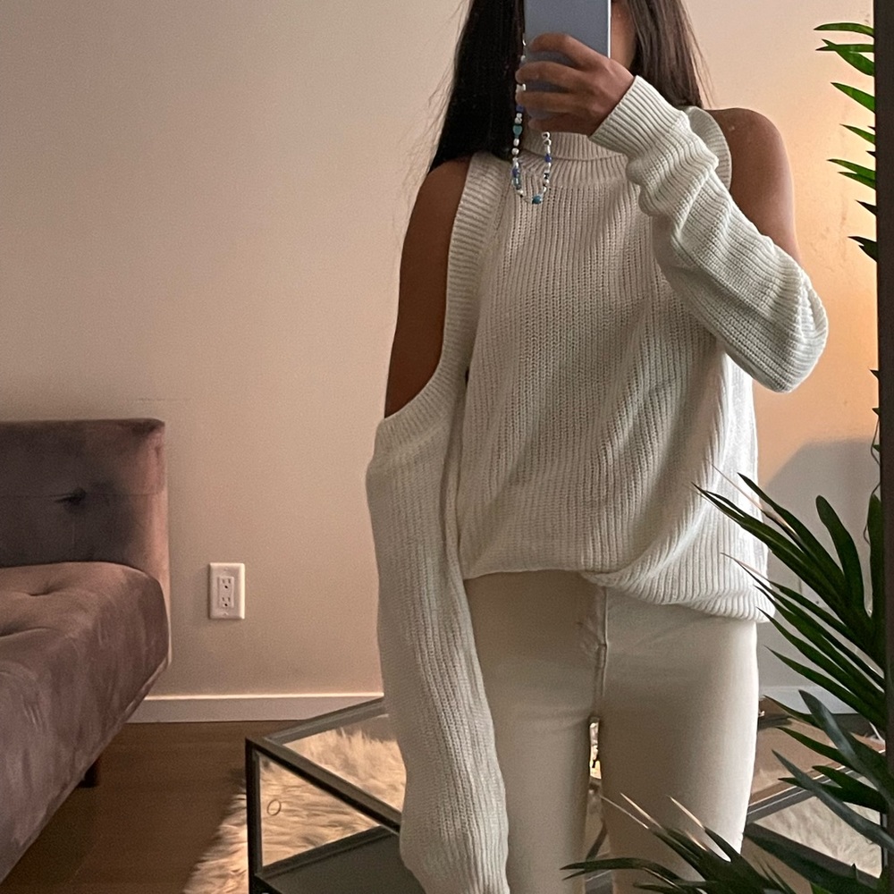 Off-shoulder white sweater